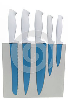 A set of blue knives on a stand isolated on a white background