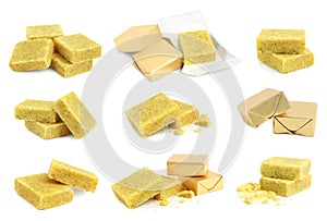 Set with bouillon cubes on white background