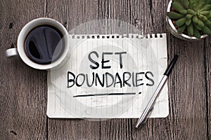 Set boundaries, text words typography written on paper against wooden background, life and business motivational inspirational