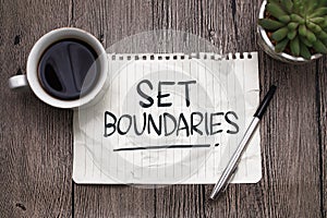 Set boundaries, text words typography written on paper against wooden background, life and business motivational inspirational photo