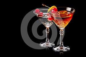 Set of Bourbon Manhattan cocktail with vermouth and maraschino cherry garnish isolated on black background/