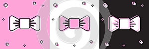 Set Bow tie icon isolated on pink and white, black background. Vector Illustration