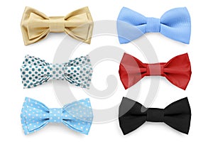 Set with bow ties of different colors isolated on white, top view