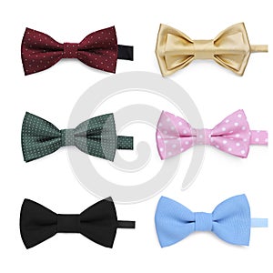 Set with bow ties of different colors isolated on white, top view