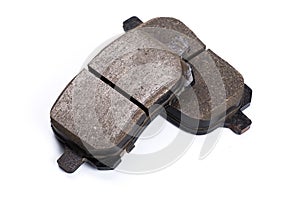 Set of brake pads, car spares isolated on white background