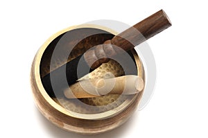 A set of brass handmade Tibetan singing bowl with wooden strikers