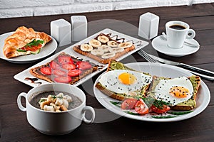 Set breakfast egg sandwiches, croissants with juice, eggs, croissants and orange juice. Balanced diet