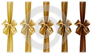 Set of bright golden and brown colored ribbons with bows isolated on white background, top view, for gift greeting card, Merry