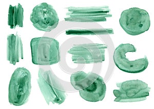 Set of bright green watercolor brushstroke stains