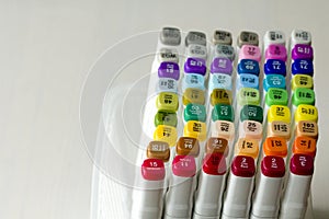 Set of bright multi-colored felt-tip pens or markers with designation of numbers and the name of color. Photo for creativity,