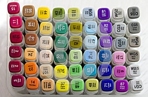 Set of bright multi-colored felt-tip pens or markers with designation of numbers and the name of color. Photo for creativity,