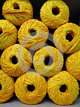 Set of bright yellow rayon chenille yarn balls photo