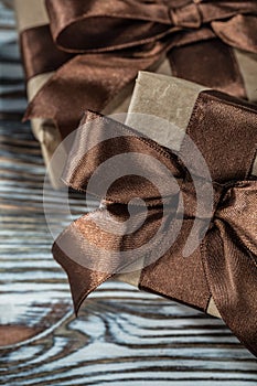 Set of brown gift boxes on wooden background