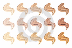Set of brush strokes for makeup in different colour isolated on white background. Foundation face make-up samples, texture of face