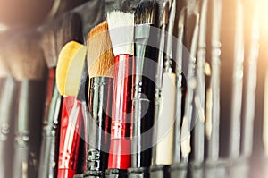 A set of brushes for applying makeup. Closeup, selective focus
