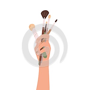 Set of brushes for make up. Flat vector illustration of makeup artist hand holding collection of cosmetic accessory for