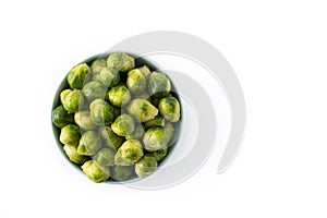 Set of brussel sprouts in a bowl isolated on white background
