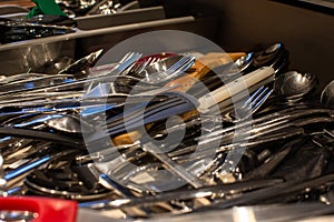 Set of bunch of kitchen utensils in drawer