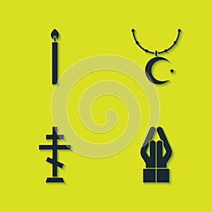 Set Burning candle, Hands praying position, Christian cross and Star crescent chain icon. Vector