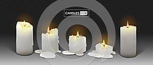 Set of burning white candles on a transparent background