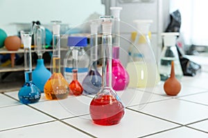Set of cabinets with color reqagents in a pharmaceutic laboratory photo