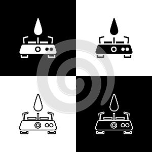 Set Camping gas stove icon isolated on black and white background. Portable gas burner. Hiking, camping equipment