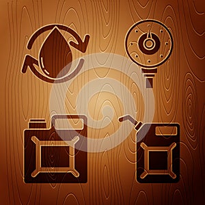 Set Canister for gasoline, Oil drop, Canister for gasoline and Motor gas gauge on wooden background. Vector