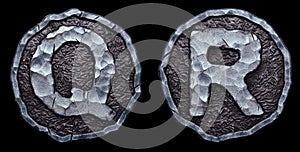 Set of capital letters Q, R made of forged metal in the center of coin isolated on black background. 3d