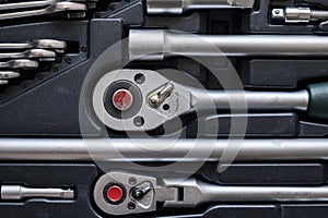 Set of car tools in toolbox. Repair service. Toolkit. Adjustable metallic tools in auto shop.