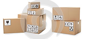 Set of cardboard boxes with packaging symbols on white background. Banner design