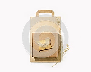 Set of cardboard boxes and paper bag for packaging goods