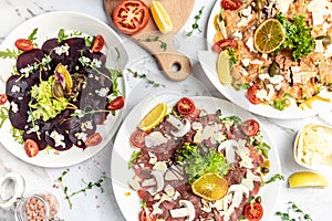 Set Carpaccio. Beef, salmon, beet Carpaccio. italian cuisine. banner, menu, recipe place for text, top view