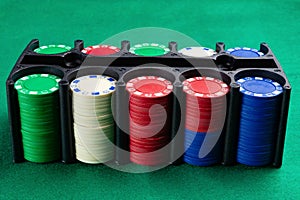 Cashino chips on a green background