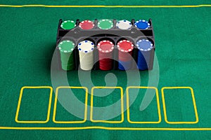Set of cashino chips on green table