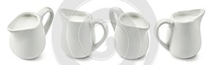 Set of ceramic milk jars or creamers isolated on white background