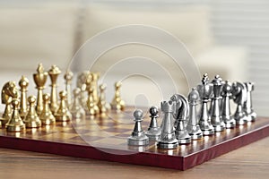 Set of chess pieces on checkerboard before game, selective focus. Space for text