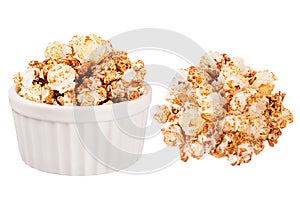 Set of chocolate popcorn as heap and in ceramics bowl isolated on white background.