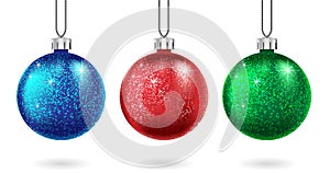 Set of Christmas red, blue and green ball isolated. Sparkling glitter bauble. Christmas and New Year bauble for cards photo