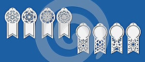 Set of Christmas tags in the form of medals with carved openwork snowflakes and place for your text