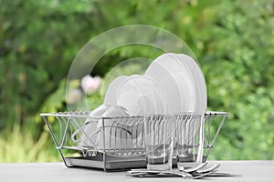 Set of clean dishware on table