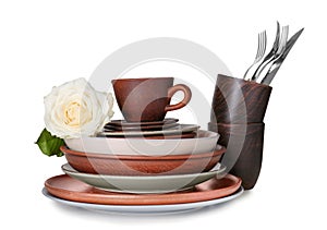 Set of clean tableware on white background