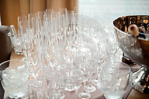 Set of clear and empty glasses for alcoholic drinks on the table