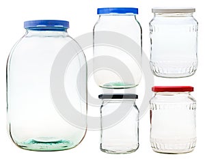 Set of closed glass jars isolated on white