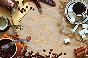 Set of coffee grinder, coffee makers, cup, coffee beans, sugar and cinnamon
