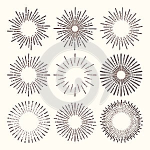 Set and collection of trendy hand drawn retro sunburst/bursting rays design elements.