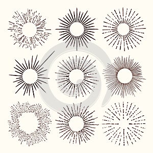 Set and collection of trendy hand drawn retro sunburst/bursting rays design elements.