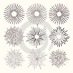 Set and collection of trendy hand drawn retro sunburst/bursting rays design elements.