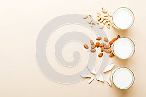 Set or collection of various vegan milk almond, coconut, cashew, on table background. Vegan plant based milk and