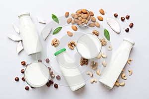 Set or collection of various vegan milk almond, coconut, cashew, on table background. Vegan plant based milk and