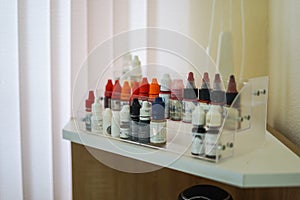 Set of color correction ink bottle for cosmetic tattoo. Many Microblading Permanent Makeup Pigments in Bottled Store